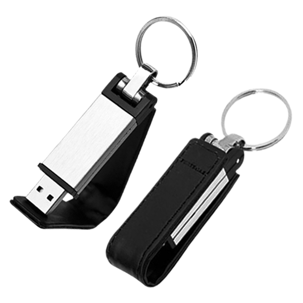 USB004-04GB, USB de piel con arillo metalico y funcion de llavero. Ademas cuenta con un clip de iman para una mejor proteccion.